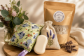 The Lavender Escape self-care bundle with koala heat pack, lavender bath salts, soap, and lavender sachet